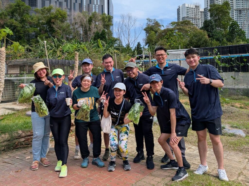 Malaysian team volunteering at Cyberjaya urban farm 2026
